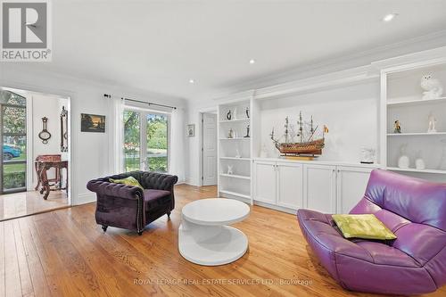 Living Room w/Custom Cabinetry & Display Shelving - 666 Cedar Avenue, Burlington, ON - Indoor Photo Showing Living Room