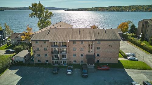 Aerial photo - 403-100 Rue Du Lac, Sherbrooke (Brompton/Rock Forest/Saint-Élie/Deauville), QC - Outdoor With Body Of Water With View