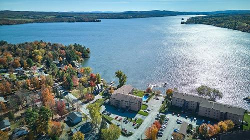 Aerial photo - 403-100 Rue Du Lac, Sherbrooke (Brompton/Rock Forest/Saint-Élie/Deauville), QC - Outdoor With Body Of Water With View