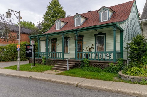 Front of Structure - 1-152  - 154 Boul. Ste-Rose, Laval (Sainte-Rose), QC - Outdoor With Deck Patio Veranda