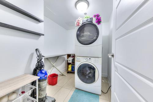 Salle de lavage - 206-603 Rue Robert-Élie, Laval (Laval-Des-Rapides), QC - Indoor Photo Showing Laundry Room
