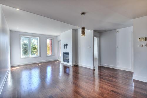 Other - 301-1335 Rue Graveline, Laval (Sainte-Dorothée), QC - Indoor With Fireplace