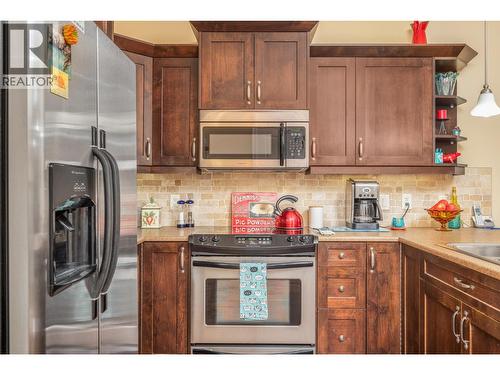 9100 Mackie Drive Unit# 212, Coldstream, BC - Indoor Photo Showing Kitchen