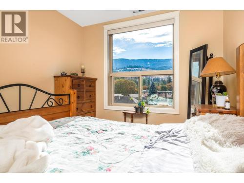 9100 Mackie Drive Unit# 212, Coldstream, BC - Indoor Photo Showing Bedroom