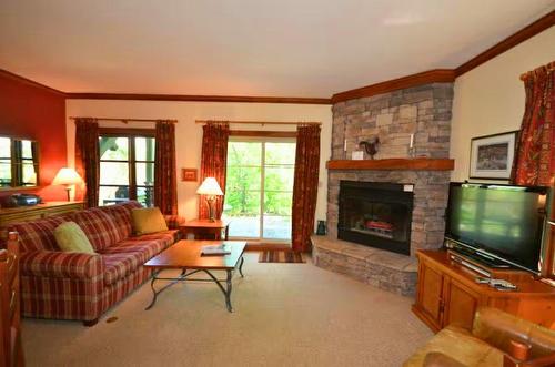 Living room - 3-206 Ch. De La Forêt, Mont-Tremblant, QC - Indoor Photo Showing Living Room With Fireplace