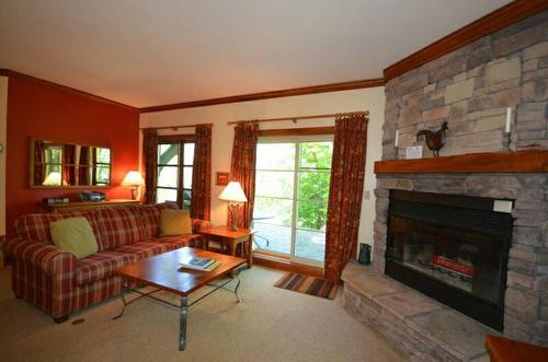 Living room - 3-206 Ch. De La Forêt, Mont-Tremblant, QC - Indoor Photo Showing Living Room With Fireplace