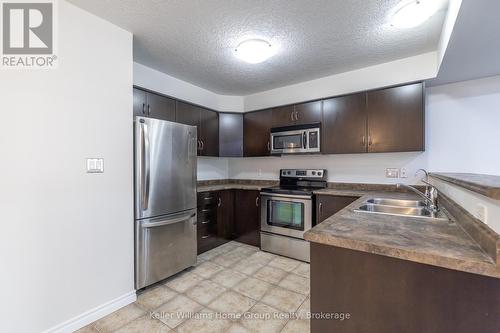 35 Amsterdam Cres, Guelph (Pineridge/Westminster Woods), ON - Indoor Photo Showing Kitchen With Stainless Steel Kitchen With Double Sink