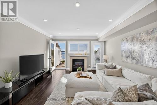 59 Cranberry Surf, Collingwood, ON - Indoor Photo Showing Living Room With Fireplace