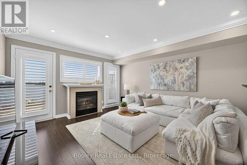 59 Cranberry Surf, Collingwood, ON - Indoor Photo Showing Living Room With Fireplace