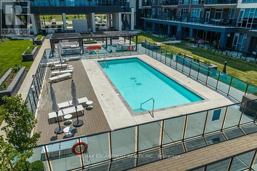 118 - 16 Concord Place, Grimsby, ON - Outdoor With In Ground Pool