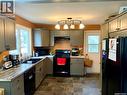 204 4Th Street E, Carnduff, SK  - Indoor Photo Showing Kitchen With Double Sink 