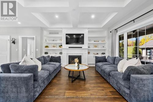 122 Glens Of Antrim Way, Alnwick/Haldimand, ON - Indoor Photo Showing Living Room With Fireplace