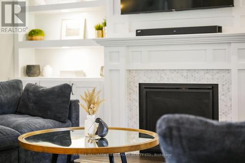 122 Glens Of Antrim Way, Alnwick/Haldimand, ON - Indoor Photo Showing Living Room With Fireplace