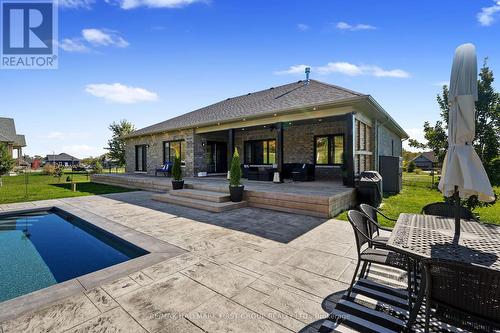122 Glens Of Antrim Way, Alnwick/Haldimand, ON - Outdoor With In Ground Pool With Deck Patio Veranda
