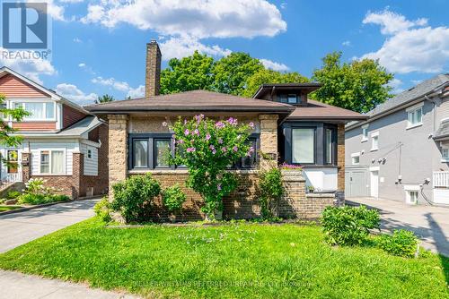 Lower - 2556 Lake Shore Boulevard W, Toronto, ON - Outdoor With Facade