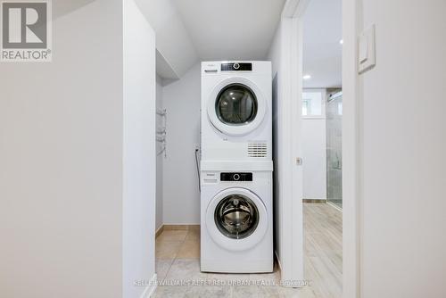 Lower - 2556 Lake Shore Boulevard W, Toronto, ON - Indoor Photo Showing Laundry Room