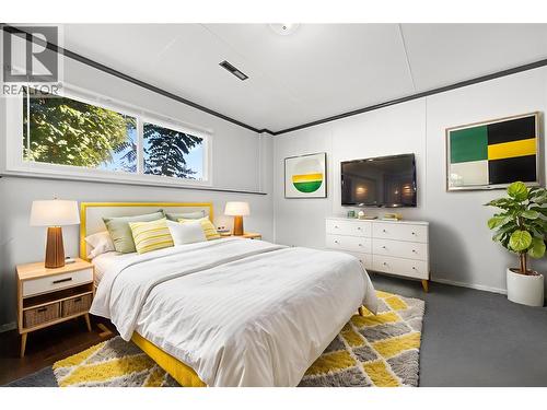Virtually Staged - Downstairs Bedroom - 10212 Happy Valley Road, Summerland, BC - Indoor Photo Showing Bedroom
