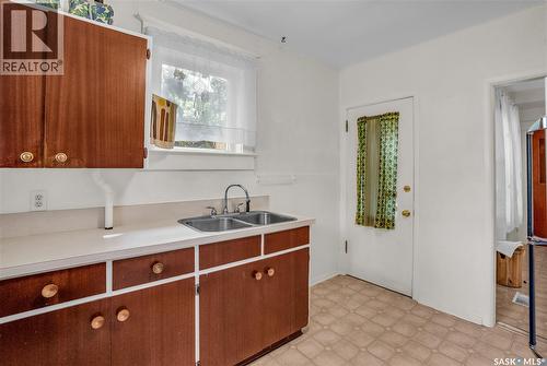 118 28Th Street W, Saskatoon, SK - Indoor Photo Showing Kitchen With Double Sink
