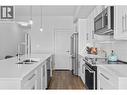 3630 Mission Springs Drive Unit# 506, Kelowna, BC  - Indoor Photo Showing Kitchen With Stainless Steel Kitchen With Double Sink With Upgraded Kitchen 