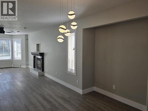 947 Laurel Road, Quesnel, BC - Indoor Photo Showing Other Room With Fireplace