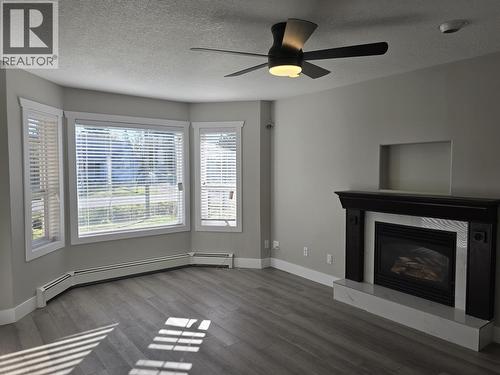 947 Laurel Road, Quesnel, BC - Indoor Photo Showing Living Room With Fireplace