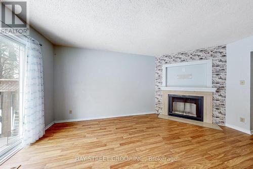 13 - 1232 Guelph Line, Burlington, ON - Indoor Photo Showing Living Room With Fireplace