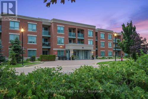 117 - 50 Via Rosedale, Brampton, ON - Outdoor With Balcony With Facade