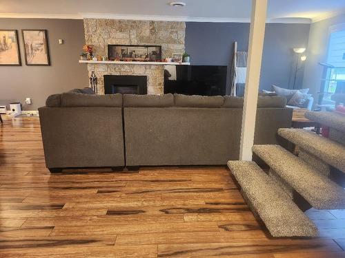 1 Wilkinson Crescent, Portage La Prairie, MB - Indoor Photo Showing Living Room With Fireplace