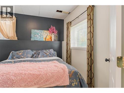 1518 3B Highway, Fruitvale, BC - Indoor Photo Showing Bedroom