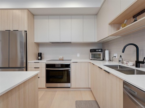 307-3564-A Ryder Hesjedal Way, Colwood, BC - Indoor Photo Showing Kitchen With Double Sink With Upgraded Kitchen
