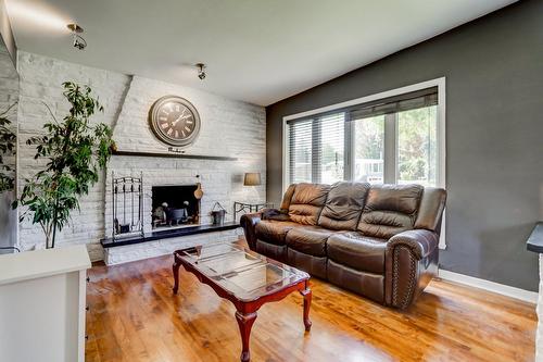 Salon - 451 Boul. Bourassa, Saint-Jérôme, QC - Indoor Photo Showing Living Room With Fireplace