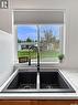 17 White Poplar Crescent, Candle Lake, SK  - Indoor Photo Showing Kitchen With Double Sink 