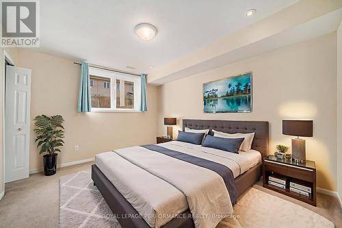 Photo is virtually staged. - 52 - 130 Berrigan Drive, Ottawa, ON - Indoor Photo Showing Bedroom