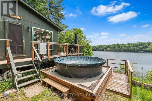 49 Sleepy Hollow Road, Rideau Lakes, ON - Outdoor With Body Of Water With Deck Patio Veranda