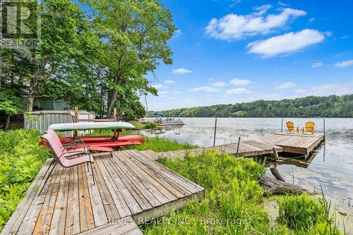 49 Sleepy Hollow Road, Rideau Lakes, ON - Outdoor With Body Of Water With Deck Patio Veranda