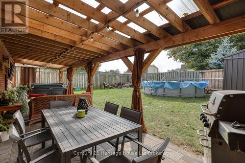 275 Cartier Drive N, Woodstock (Woodstock - North), ON - Outdoor With Above Ground Pool With Deck Patio Veranda With Exterior