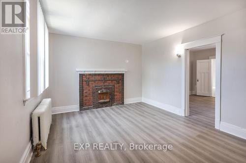 109 Balsam Avenue S, Hamilton, ON - Indoor Photo Showing Living Room With Fireplace