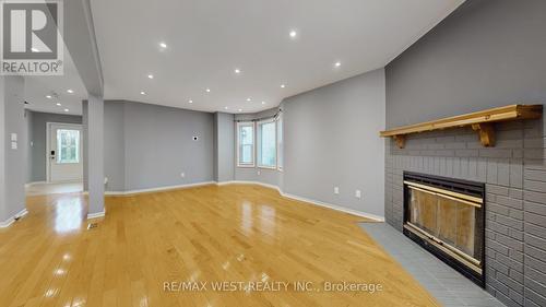 Beautiful Hardwood Floor - 7147 Harding Crescent, Mississauga, ON - Indoor With Fireplace