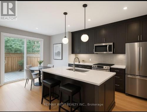 Virtually Staged Space - 7147 Harding Crescent, Mississauga, ON - Indoor Photo Showing Kitchen With Stainless Steel Kitchen With Upgraded Kitchen