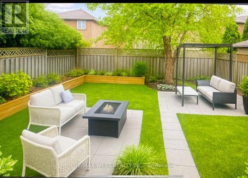 Garden Virtually Staged - 7147 Harding Crescent, Mississauga, ON - Outdoor With Deck Patio Veranda