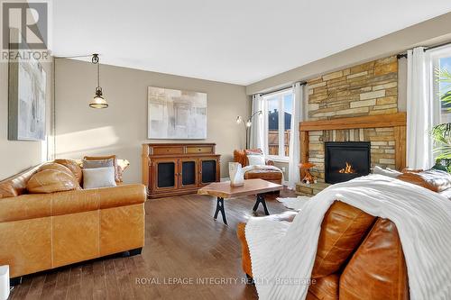 318 Everglade Way Way, Ottawa, ON - Indoor Photo Showing Living Room With Fireplace
