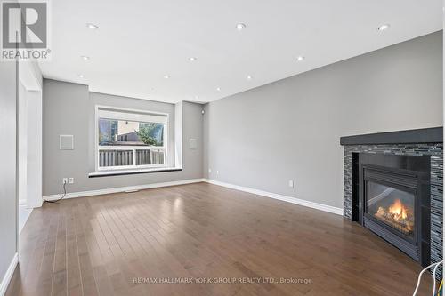 5562 Broadpath Gate, Mississauga, ON - Indoor Photo Showing Living Room With Fireplace