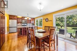 Gorgeous bright kitchen with tons of cupboards - 