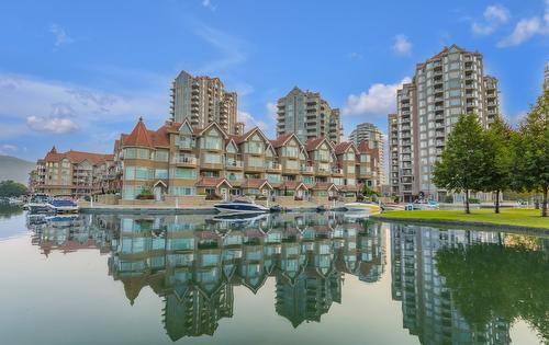 501-1152 Sunset Drive, Kelowna, BC - Outdoor With Body Of Water With Facade