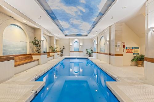501-1152 Sunset Drive, Kelowna, BC - Indoor Photo Showing Other Room With In Ground Pool