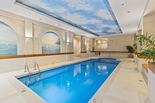 501-1152 Sunset Drive, Kelowna, BC - Indoor Photo Showing Other Room With In Ground Pool