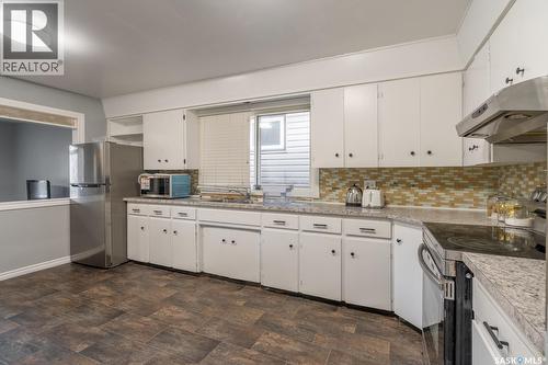 1321 Victoria Avenue, Regina, SK - Indoor Photo Showing Kitchen With Double Sink
