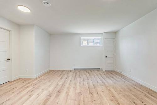 Basement - Rue Siméon-Drolet, Québec (Les Rivières), QC - Indoor Photo Showing Other Room