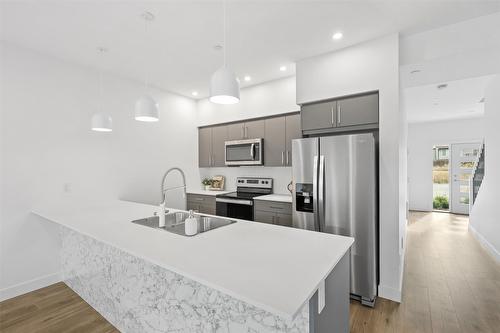 116-8960 Dallas Drive, Kamloops, BC - Indoor Photo Showing Kitchen With Stainless Steel Kitchen With Double Sink With Upgraded Kitchen