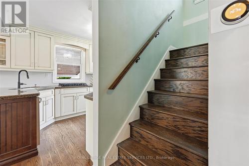 Hardwood Staircase Leading to the Upper Level - 677 Greenwood Drive, Burlington, ON - Indoor Photo Showing Other Room